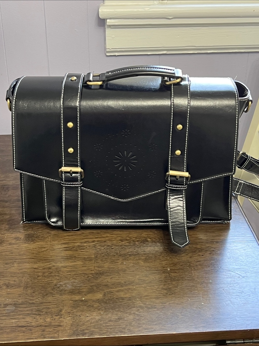 Vintage inspired messenger backpack